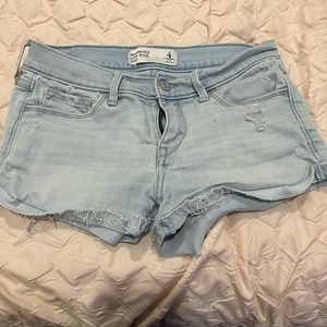 LOW RISE womens jean shorts. very light blue